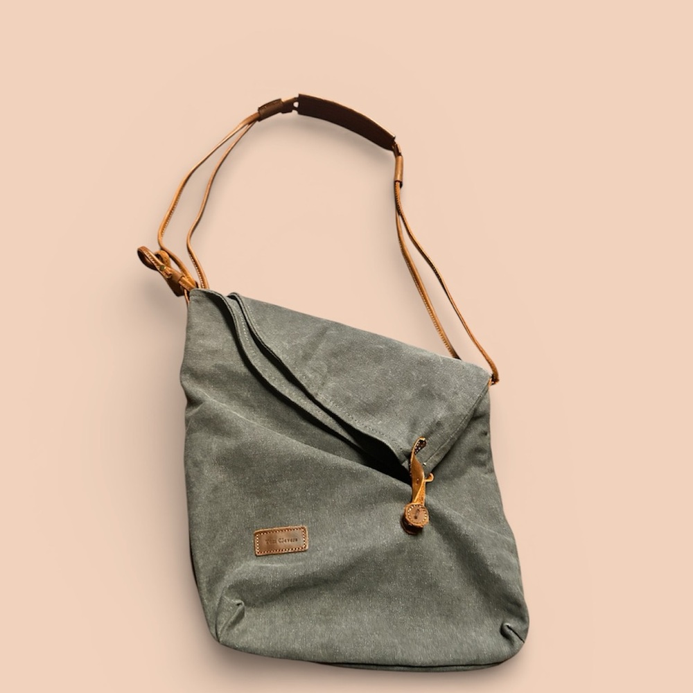 Tom Clovers grey canvas and leather convertible tote nwot.